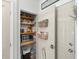 Convenient pantry offering ample storage space for food items and kitchen essentials at 901 W Port Dr. # 2114, North Myrtle Beach, SC 29582