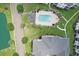 Aerial view showcases the pool area with sun loungers and landscaping at 901 W Port Dr. # 2114, North Myrtle Beach, SC 29582