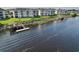 Exterior of waterfront condos showcasing manicured lawns and private boat dock at 901 W Port Dr. # 2114, North Myrtle Beach, SC 29582