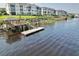 Tranquil water view with a dock, gazebo and condos in the background at 901 W Port Dr. # 2114, North Myrtle Beach, SC 29582