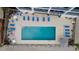 Overhead view of the pool and lounge chairs near the beach at 920 N Waccamaw Dr. # 2310, Murrells Inlet, SC 29576