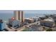 Aerial view of building showing ocean views, parking, and easy beach access at 920 N Waccamaw Dr. # 2310, Murrells Inlet, SC 29576