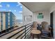 Relaxing balcony overlooking the beach with seating, providing a stunning ocean view at 920 N Waccamaw Dr. # 2310, Murrells Inlet, SC 29576
