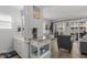 Bright kitchen with a view into the living room and sliding glass doors at 920 N Waccamaw Dr. # 2310, Murrells Inlet, SC 29576