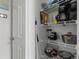 Pantry with stocked shelves and door at 920 N Waccamaw Dr. # 2310, Murrells Inlet, SC 29576