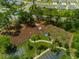 Aerial view of the community garden and dog park, providing outdoor activities and community engagement at 964 Irving Dr., Little River, SC 29566