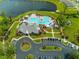 Aerial view of community pool and clubhouse, offering a recreational hub with lush landscaping and parking at 964 Irving Dr., Little River, SC 29566