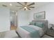 Cozy bedroom with soft carpet, stylish ceiling fan, and soothing wall art at 964 Irving Dr., Little River, SC 29566