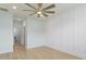 Bright bedroom with hardwood floors, ceiling fan, and ample natural light at 964 Irving Dr., Little River, SC 29566