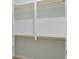 Spacious closet with ample storage space, shelving, and wooden rods at 964 Irving Dr., Little River, SC 29566