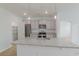 Bright, modern kitchen featuring granite countertops, stainless steel appliances, and ample cabinet space at 964 Irving Dr., Little River, SC 29566