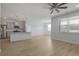 Open living space connects the kitchen and dining area and features hardwood floors at 964 Irving Dr., Little River, SC 29566