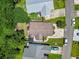 Aerial view of house displaying the roof, driveway and surrounding yard within a suburban neighborhood at 1007 Autumn Dr., Murrells Inlet, SC 29576