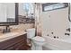 Elegant bathroom with tub and shower, showcasing stylish fixtures and design at 1007 Autumn Dr., Murrells Inlet, SC 29576