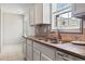 Updated kitchen with stainless steel sink and window view at 1007 Autumn Dr., Murrells Inlet, SC 29576