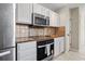 Modern kitchen featuring stainless steel appliances and sleek countertops at 1007 Autumn Dr., Murrells Inlet, SC 29576