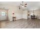 Spacious living room featuring modern wood flooring, a ceiling fan and neutral walls at 1007 Autumn Dr., Murrells Inlet, SC 29576