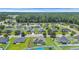 Aerial view of neighborhood homes surrounded by green trees at 1036 Macala Dr., Conway, SC 29526