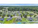 Aerial view of neighborhood homes with green lawns and mature trees at 1036 Macala Dr., Conway, SC 29526