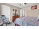 Bedroom featuring a four-poster bed, tan walls, ceiling fan, and neutral carpet at 1036 Macala Dr., Conway, SC 29526