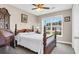Cozy bedroom with wooden furniture and a large window offering a street view at 1036 Macala Dr., Conway, SC 29526