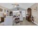 Inviting living room showcasing a vaulted ceiling, display cabinet, and a cozy seating area at 1036 Macala Dr., Conway, SC 29526