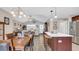 Open concept featuring kitchen island, dining and living spaces at 1036 Macala Dr., Conway, SC 29526