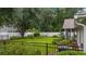 Well maintained backyard and garden bordered with a white and black fence provides a safe and beautiful outdoor area at 104 Ashton Circle, Myrtle Beach, SC 29588