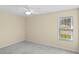Bedroom with plush carpeting, neutral walls and a window providing natural light and view at 104 Ashton Circle, Myrtle Beach, SC 29588