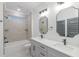 Bathroom with double vanity, tile backsplash, and shower-tub combo at 1054 East Isle Of Palms Ave., Myrtle Beach, SC 29579