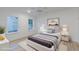 This bedroom features two large windows, wood floors and a white and grey color scheme at 1054 East Isle Of Palms Ave., Myrtle Beach, SC 29579