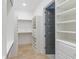 This walk-in closet has ample storage space with built in shelves and drawers at 1054 East Isle Of Palms Ave., Myrtle Beach, SC 29579