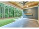 Relaxing covered patio with wood ceiling and view of the beautiful, lush backyard at 1054 East Isle Of Palms Ave., Myrtle Beach, SC 29579