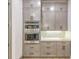 Kitchen area featuring stainless steel appliances, custom cabinetry, and ample storage with drawers and cupboards at 1054 East Isle Of Palms Ave., Myrtle Beach, SC 29579