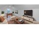 Inviting living room featuring ample seating, pool table, and entertainment center at 1054 East Isle Of Palms Ave., Myrtle Beach, SC 29579