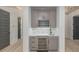 Elegant wet bar featuring custom cabinetry, a wine refrigerator, and stylish fixtures for entertaining guests at 1054 East Isle Of Palms Ave., Myrtle Beach, SC 29579