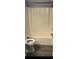 Bathroom with tub/shower combination, toilet and vinyl flooring at 1101 2Nd Ave. N # 306, Surfside Beach, SC 29575