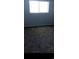 Carpeted bedroom featuring a window for natural light at 1101 2Nd Ave. N # 306, Surfside Beach, SC 29575