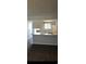 Kitchen area with a breakfast bar overlooking an adjoing living room area at 1101 2Nd Ave. N # 306, Surfside Beach, SC 29575