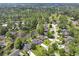 An elevated perspective reveals a beautiful, lakeside home nestled within a serene, treelined community at 112 Birchwood Ln., Conway, SC 29526