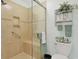 Tiled shower stall with built-in bench in a beautifully decorated bathroom at 112 Birchwood Ln., Conway, SC 29526