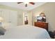 Bright bedroom with a double door closet, TV and view to a dining area at 112 Birchwood Ln., Conway, SC 29526
