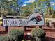 Myrtle Trace 55+ Retirement Community sign, beautifully landscaped, welcoming residents and visitors at 112 Birchwood Ln., Conway, SC 29526