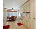 Well-lit kitchen featuring classic cabinetry and a cozy breakfast nook with backyard view at 112 Birchwood Ln., Conway, SC 29526