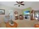 Inviting living room with cozy seating, fireplace, and mounted flat screen television at 112 Birchwood Ln., Conway, SC 29526
