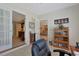 Office space featuring built-in shelving and adjacent living spaces at 112 Birchwood Ln., Conway, SC 29526