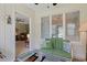 Relaxing sun room with pond view and comfortable seating at 112 Birchwood Ln., Conway, SC 29526