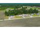 Home in a serene countryside community surrounded by sprawling fields and lush trees at 1126 Amanda Lane, Loris, SC 29569