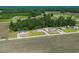 Home in a serene countryside community surrounded by sprawling fields and lush trees at 1126 Amanda Lane, Loris, SC 29569