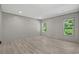 Spacious bedroom featuring light colored vinyl plank flooring and natural light at 1126 Amanda Lane, Loris, SC 29569